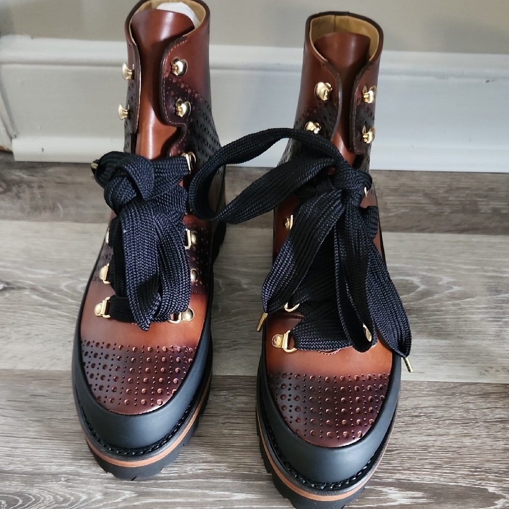 The Office of Angela Scott Brown and Black Lace-Up Boots with Gold Accents